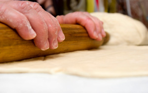 rolling pizza dough